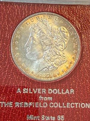 VINTAGE 1879-S MS65 GRADED/HOLDERED REDFIELD MORGAN SILVER DOLLAR AS PICTURED.