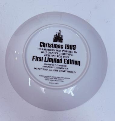 Sale Photo Thumbnail #240: Limited to 5,000 plates. Designed Exclusively for Disneyland and Walt Disney World. Made in Japan. Inspired by Walt Disney's Christmas Greeting for 1935. Measures 8 3/4" diameter. Trimmed in gold. With original box.