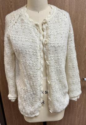 Sale Photo Thumbnail #298: In good used condition with one small light spot on one sleeve,