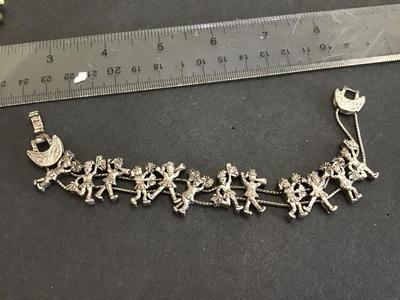 Toga. Vintage 1950 Charm Slid Bracelet. Marked