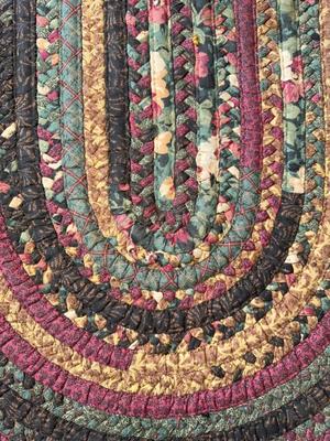 Sale Photo Thumbnail #41: T8-oval Braided rug

110 1/2 inches long
74 inches wide