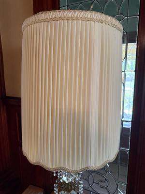Sale Photo Thumbnail #590: E13-Stunning Table Lamp

45 1/2 inches to the very top of the shade
Triangular base – 10 inch sides