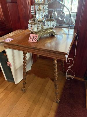 Sale Photo Thumbnail #594: E12-Antique Table

28 and three-quarter inches tall
24 1/4 inches wide
24 1/4 inches deep