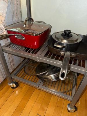 Sale Photo Thumbnail #960: M20-cart and pots/pans/lids

35 1/2 inches tall
24 inches wide
20 inches deep