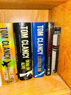 NOVELS INCLUDING TOM CLANCY, CLIVE CLUSTER, MICHAEL CRICHTON AND MORE
