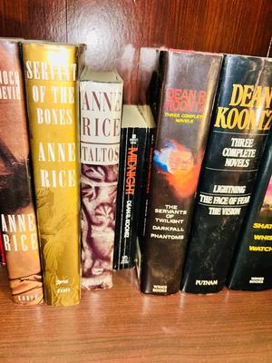 A HORRIFYING YET DELIGHTFULLY LARGE ASSORTMENT OF STEVEN KING AND DEAN KOONTZ BOOKS
