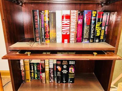 A HORRIFYING YET DELIGHTFULLY LARGE ASSORTMENT OF STEVEN KING AND DEAN KOONTZ BOOKS