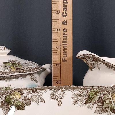 LOT 110: Johnson Bros. The Friendly Village 3-Tier Cake Stand, Butter Pat Dishes, Sugar Bowl, Creamer & More