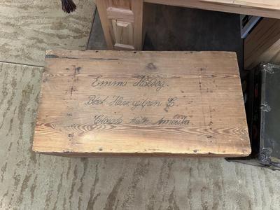 WOODEN TRUNK FROM A FOREIGN COUNTRY AND A METAL TRUNK