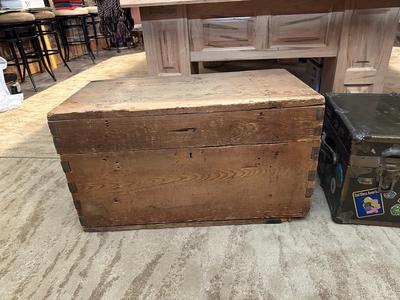 WOODEN TRUNK FROM A FOREIGN COUNTRY AND A METAL TRUNK