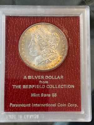 VINTAGE 1879-S MS65 GRADED/HOLDERED REDFIELD MORGAN SILVER DOLLAR AS PICTURED.