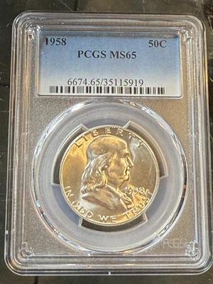 PCGS CERTIFIED 1958 MS65 FRANKLIN SILVER HALF DOLLAR AS PICTURED.