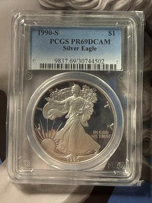 PCGS CERTIFIED 1990-S PROOF69 DEEP CAMEO SILVER EAGLE DOLLAR AS PICTURED.