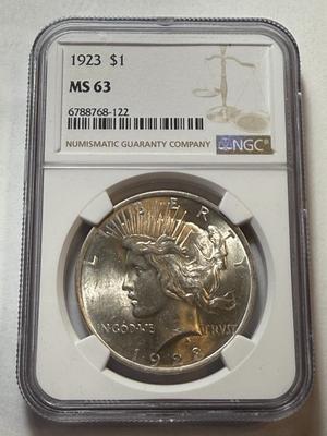 NGC CERTIFIED 1923-P MS63 PEACE SILVER DOLLAR AS PICTURED.