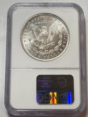 NGC CERTIFIED 1882-O MS61 MORGAN SILVER DOLLAR AS PICTURED.