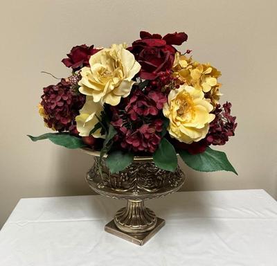 Bronze vase with faux flower arrangement