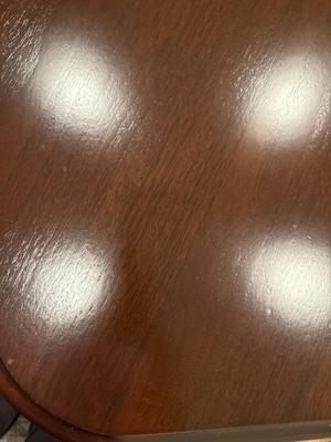 Beautiful dining room table with six leather chairs