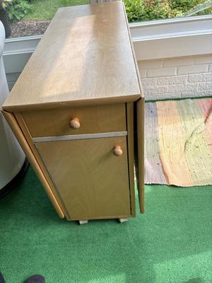 Wood drop down table with four chairs