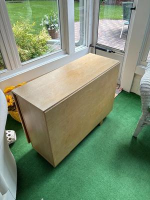 Wood drop down table with four chairs