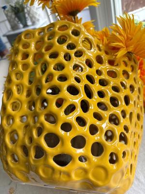 Yellow pot with sunflowers