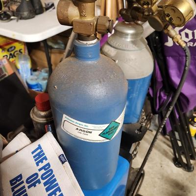 Miller Millermatic 185 Mig Welder + tanks, gloves manual and more.