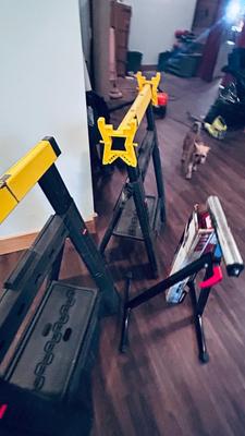 NEAT AND CONVENIENT STANLEY FOLDING SAWHORSES AND HAUL MASTER ROLLER STAND