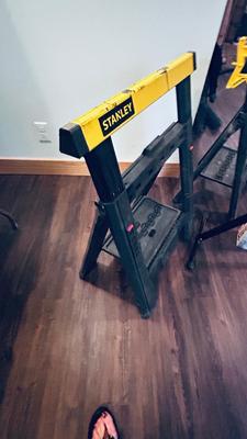 NEAT AND CONVENIENT STANLEY FOLDING SAWHORSES AND HAUL MASTER ROLLER STAND
