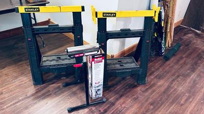 NEAT AND CONVENIENT STANLEY FOLDING SAWHORSES AND HAUL MASTER ROLLER STAND