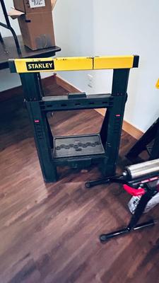 NEAT AND CONVENIENT STANLEY FOLDING SAWHORSES AND HAUL MASTER ROLLER STAND