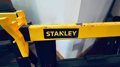 NEAT AND CONVENIENT STANLEY FOLDING SAWHORSES AND HAUL MASTER ROLLER STAND