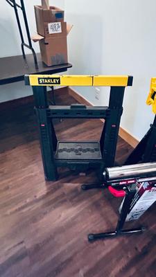 NEAT AND CONVENIENT STANLEY FOLDING SAWHORSES AND HAUL MASTER ROLLER STAND