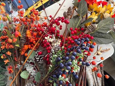 Fall flowers, two wreaths, two rugs, birch, and tote