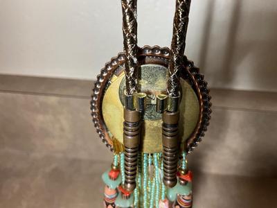 Native Am style bolo tie w/jade stone, Chinese jade pendant w/bi disc and carved pattern.