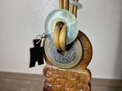 Native Am style bolo tie w/jade stone, Chinese jade pendant w/bi disc and carved pattern.