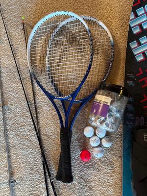 Sale Photo Thumbnail #564: Fishing poles, tennis rackets, solid ski, golf balls, and tees