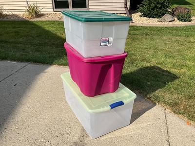 Three totes, top one 56qt, 18gal, 22gl