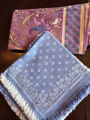 Two sets of dinner napkins