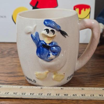 LOT 54D: The Art of Disney Book, Donald Duck Mug, Miniature Mickey Mouse Figure, Disney World Trinket Tray, Mickey Conductor Music Box,...
