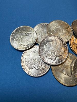 BAG #1 OF 10 DECENT SHAPE MORGAN & PEACE SILVER DOLLARS AT MELT SILVER PRICE AS PICTURED.