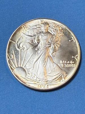 KEY DATE 1986 UNCIRCULATED SILVER EAGLE DOLLAR .999 SILVER AS PICTURED.