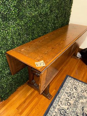 Sale Photo Thumbnail #77: E27-double drop leaf table

This table measures 6 feet long and 29.75 inches tall

The top surface is 18 inches wide with each drop Leaf being an additional 12 inches apiece