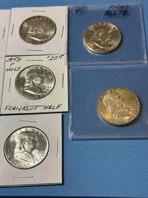 (10) UNCIRCULATED CONDITION FRANKLIN SILVER HALF DOLLARS BAG #16 RECEIVE ALL AS PICTURED.