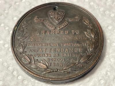 Nottingham School Board Medal 1893 - Exemplary Punctuality Awarded to; F. HUCKNALL Bronze Composition as Pictured.