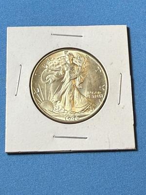 1946-P UNCIRCULATED CONDITION WALKING LIBERTY SILVER HALF DOLLAR AS PICTURED. (COIN 27).