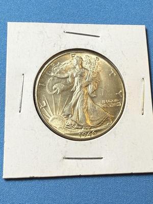 1946-P AU CONDITION WALKING LIBERTY SILVER HALF DOLLAR AS PICTURED. (COIN 28).