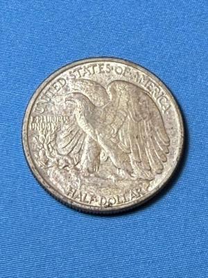 1942-P EF/AU CONDITION TONED WALKING LIBERTY SILVER HALF DOLLAR AS PICTURED. (COIN 31).