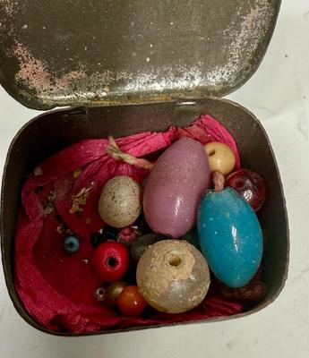 Vintage Antique Hinged tin with pieces of rocks and beads inside