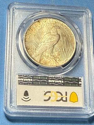 PCGS CERTIFIED 1924 MS64 LIGHTLY TONED PEACE SILVER DOLLAR AS PICTURED.