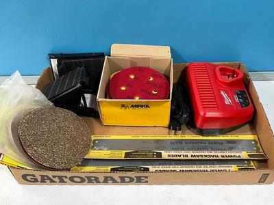 Milwaukee charger, Hacksaw blades, sander paper, Anchors for the car tires