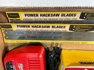 Milwaukee charger, Hacksaw blades, sander paper, Anchors for the car tires